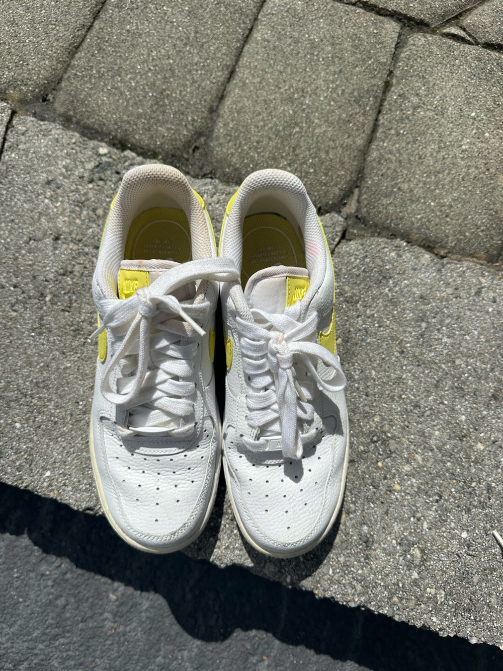 Nike Kids White Sneakers with Yellow Swoosh